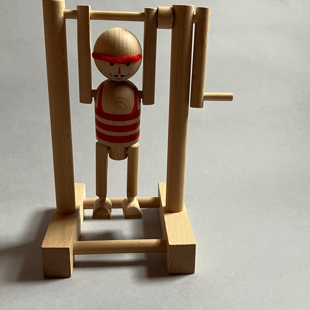 Wooden Cause and Effect Acrobat